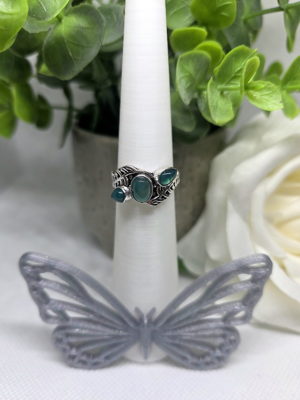 Unique Silver And Green Gemstone Leaf Ring